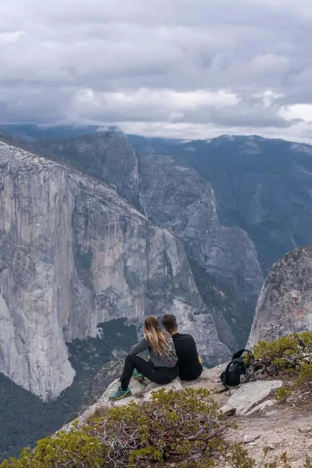 Hikers Overlooking Mountain