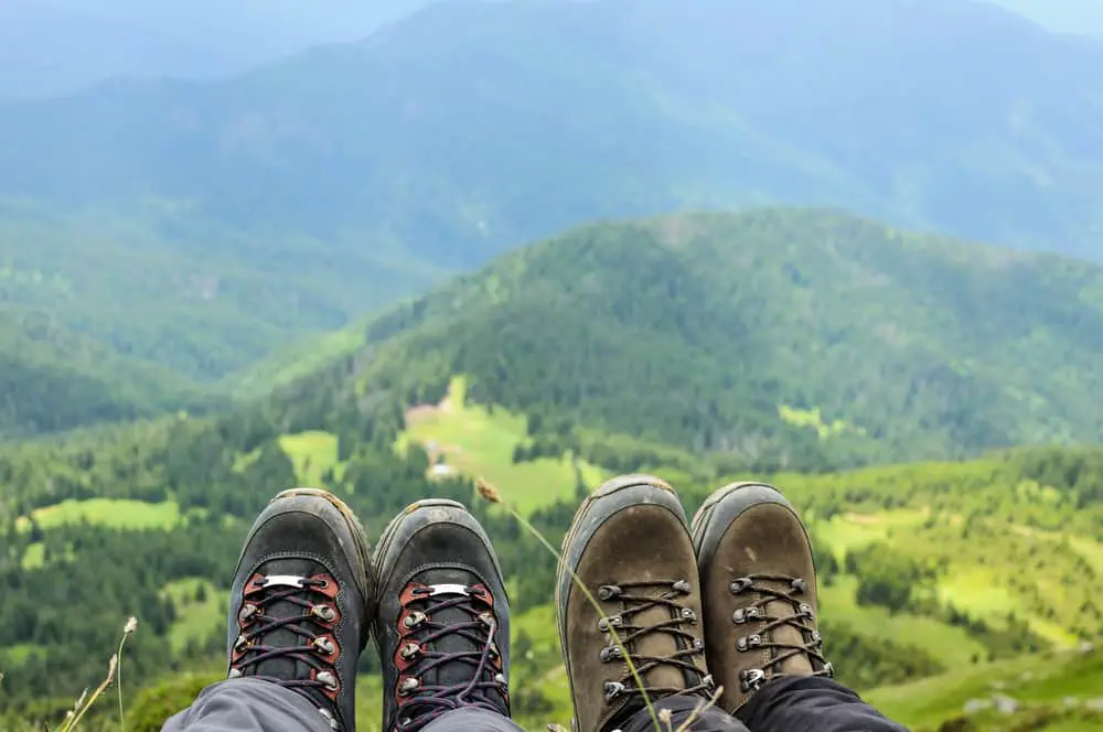 Two pairs of boots on a mountain